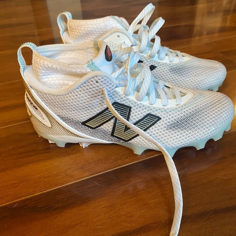 New Balance women White Cleats